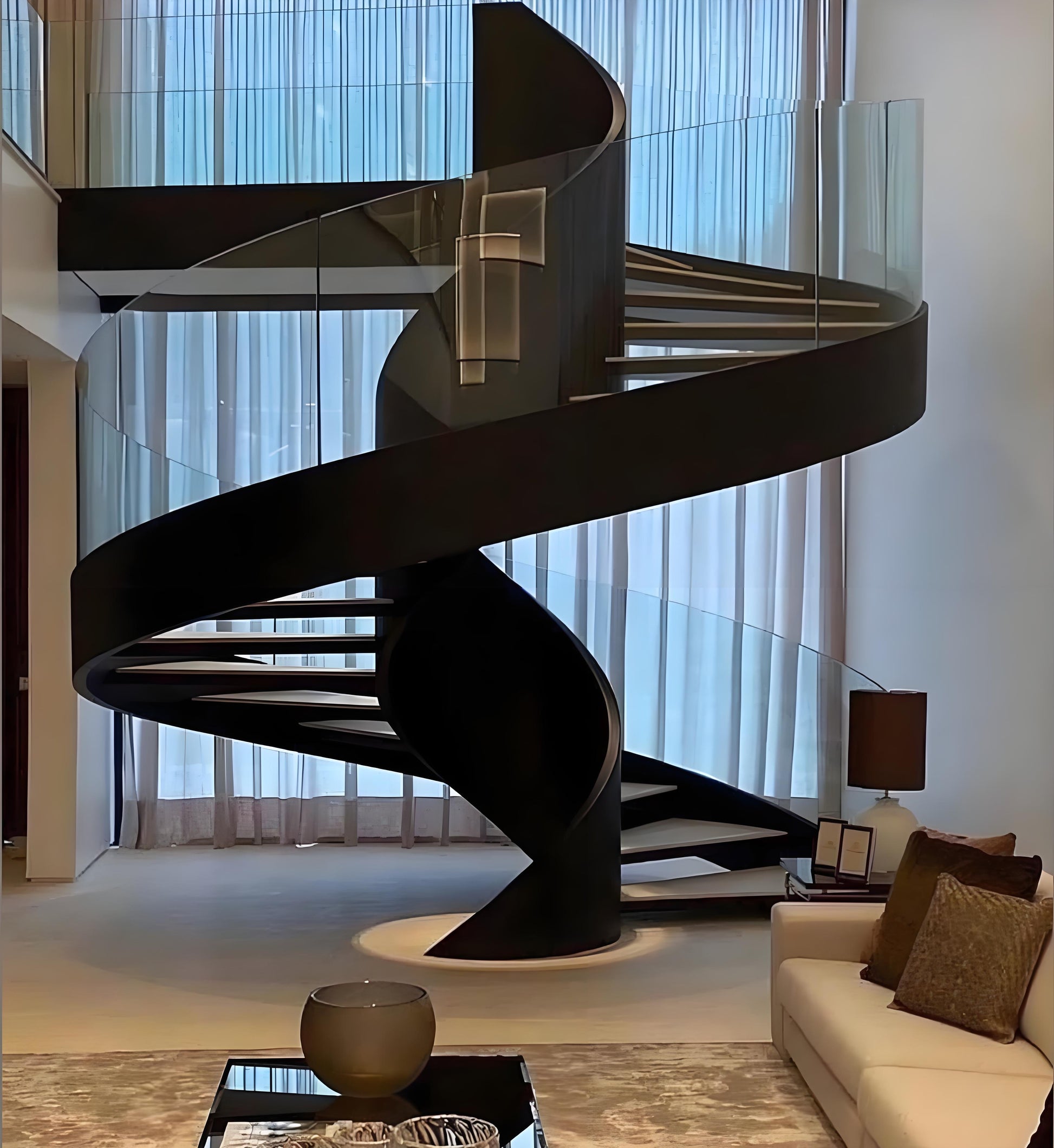 Sophisticated Indoor Black Curved Staircase with Glass Railing