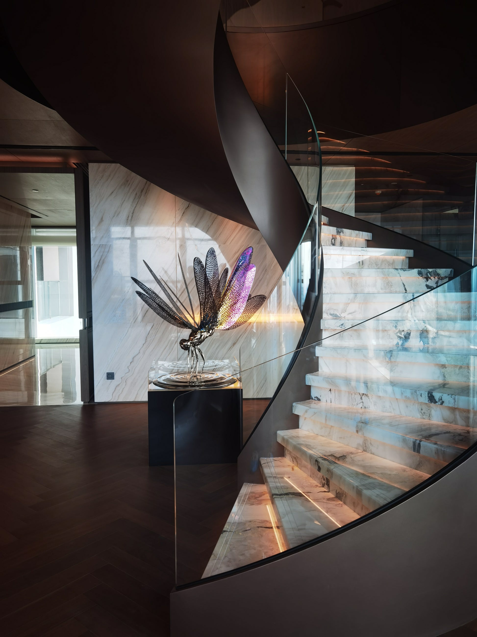 Brown glass handrail marble staircase