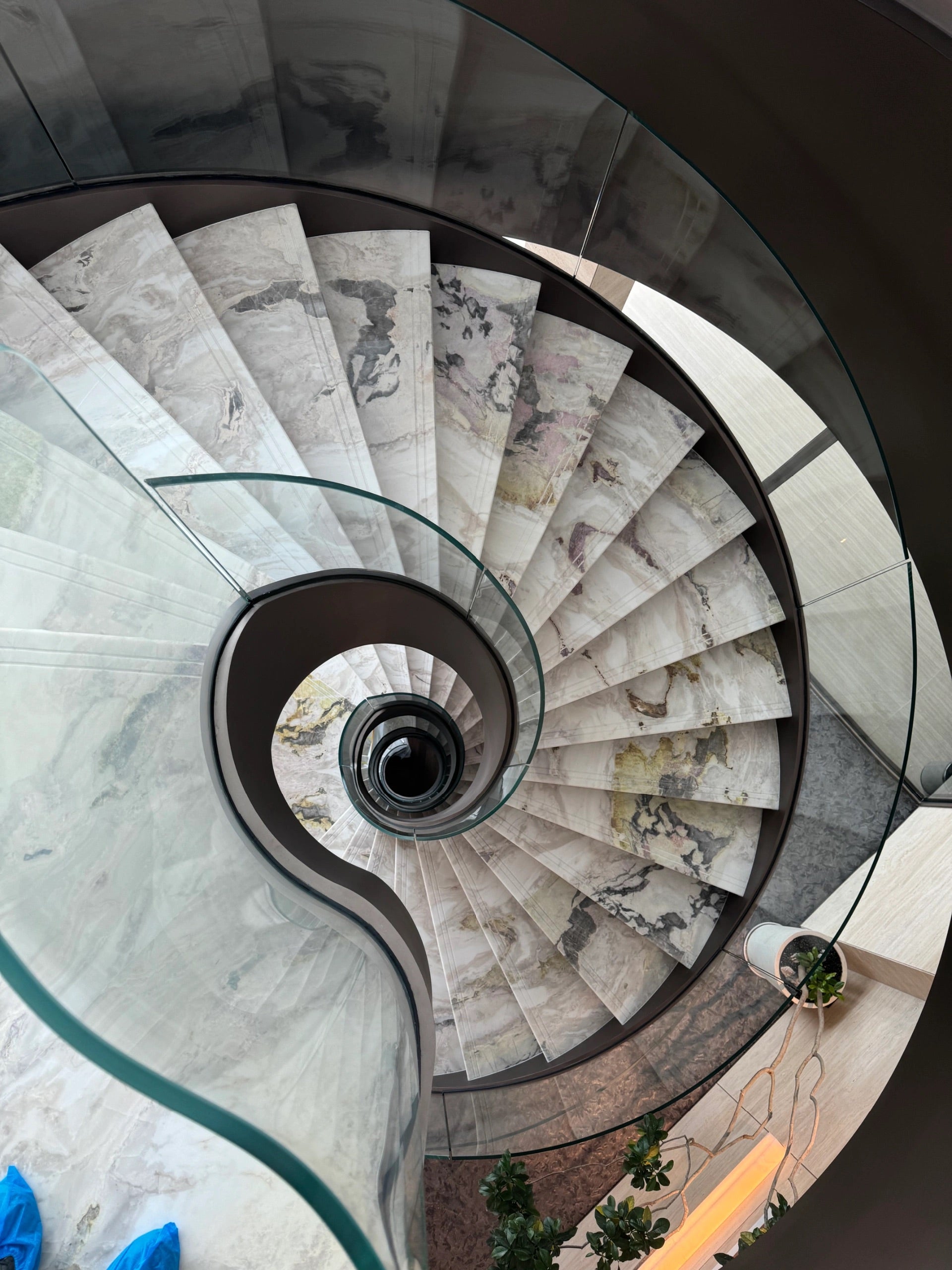 Brown glass handrail marble staircase