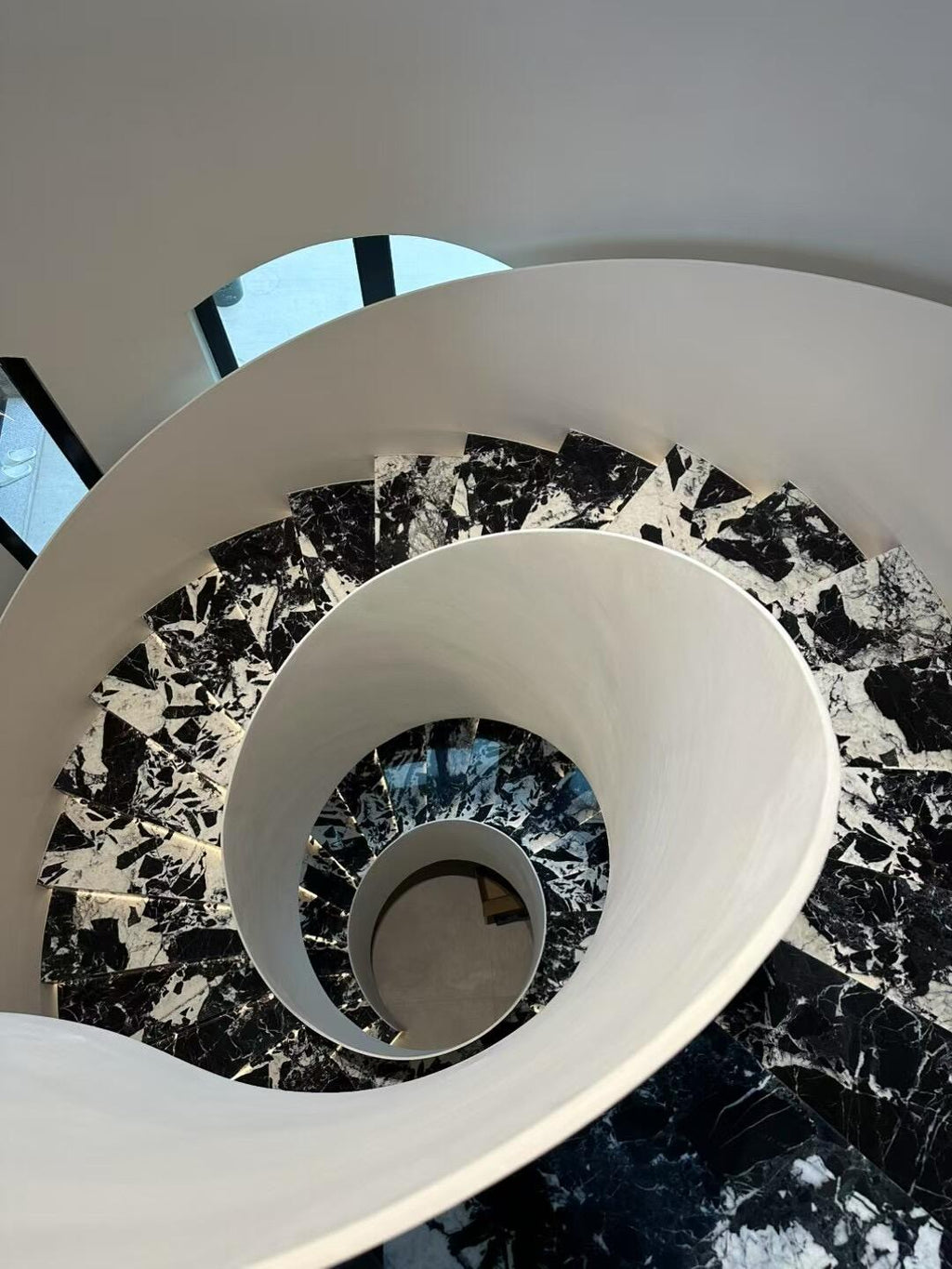 Opulent Panda White Tread Marble Curved Staircase