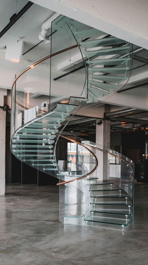 Aerial Inspired Transparent Glass Curved Staircase