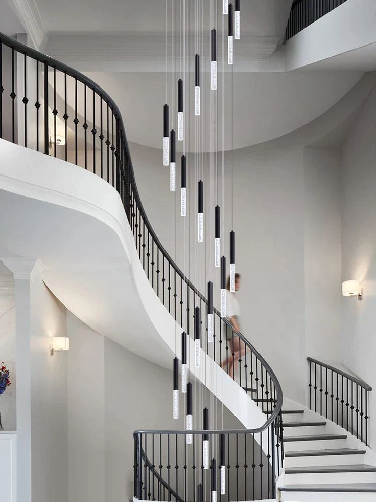 austaircase Villa Grand Foyer Curved Iron Stair Balustrade