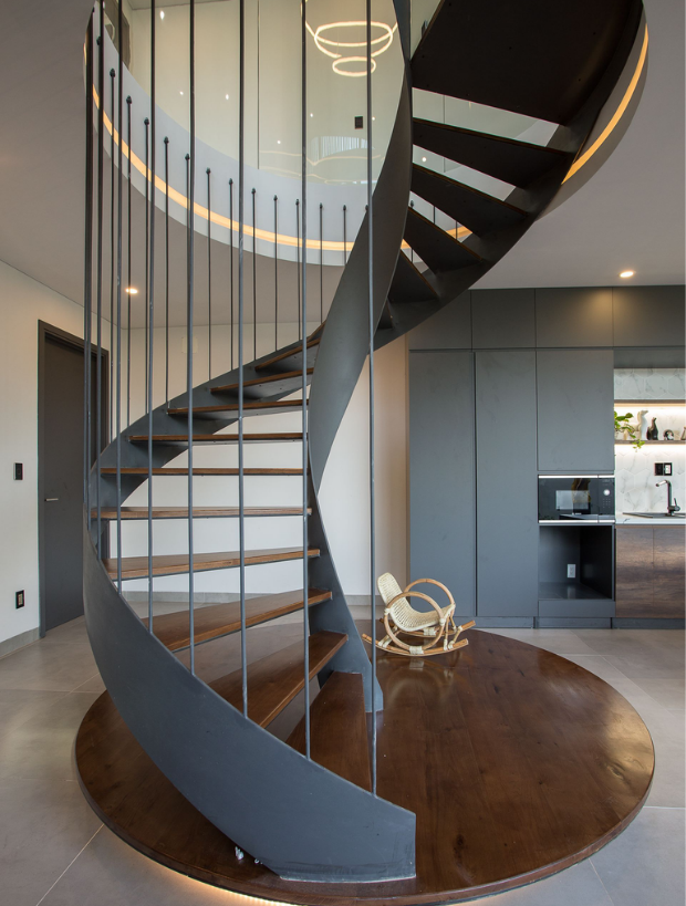 Steel beam curved staircase with wooden tread