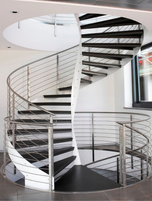 Steel beam curved staircase with wooden tread