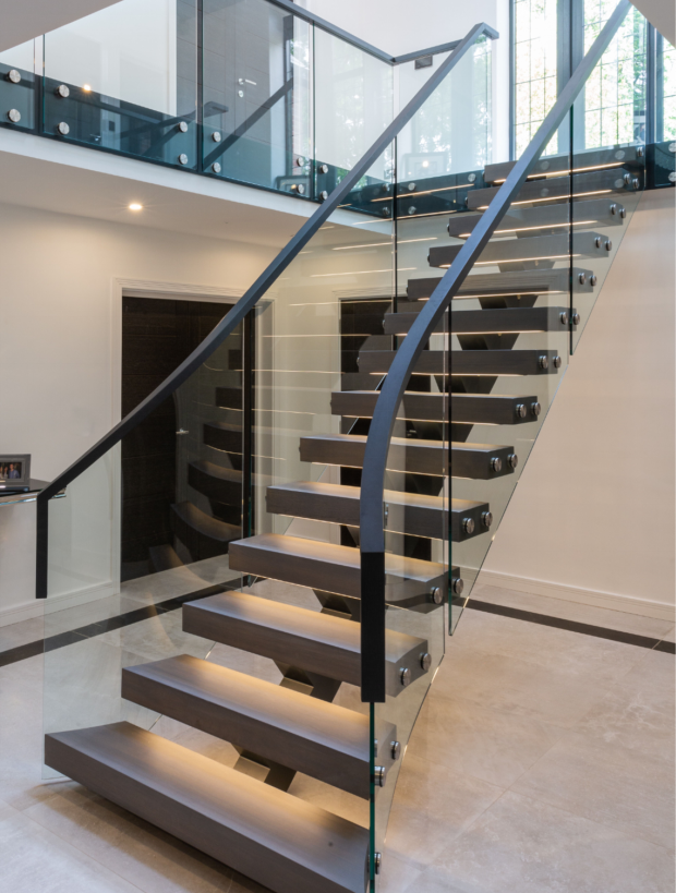 Steel center beam with straight staircase LED lighting tread home decor