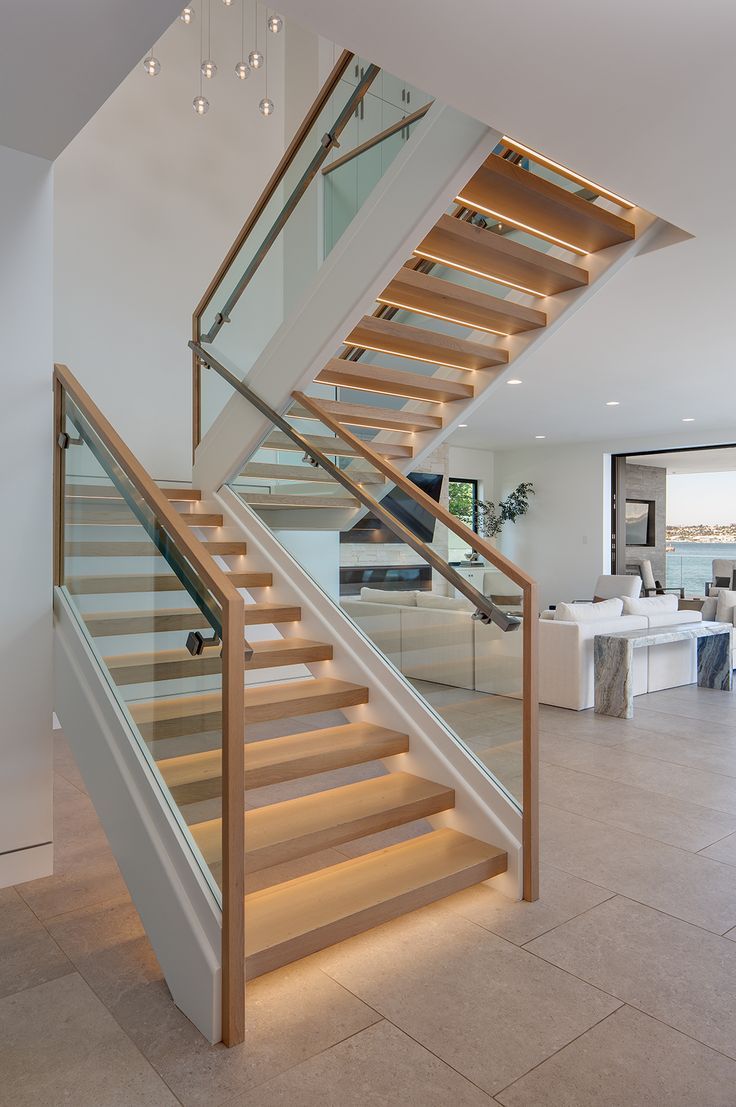 White double beam wood handrail straight staircase with glass railing