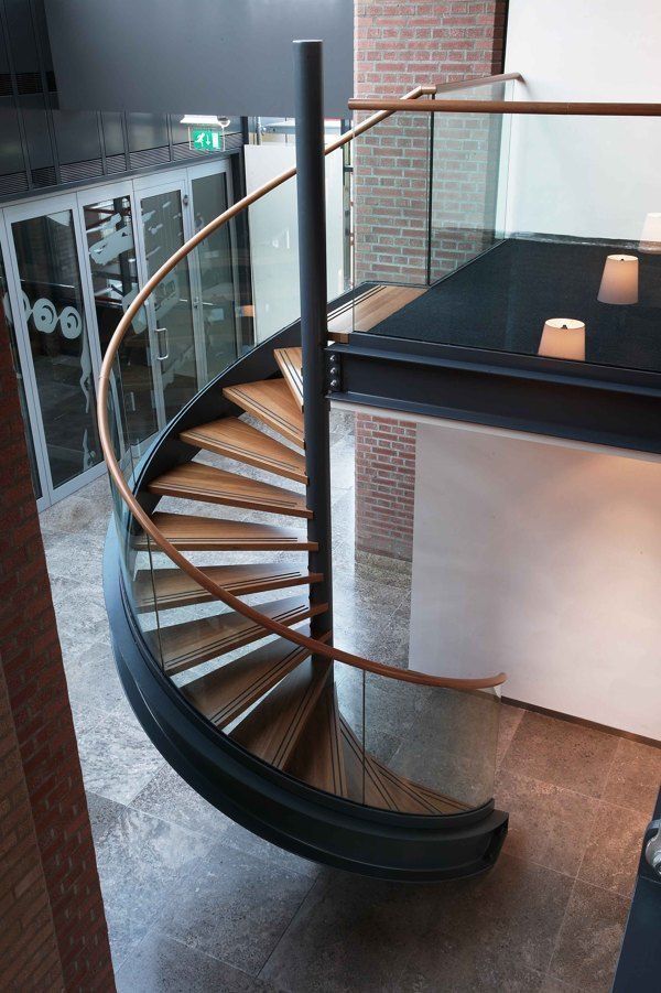 Durable Steel Spiral Staircase with heat bent glass railing