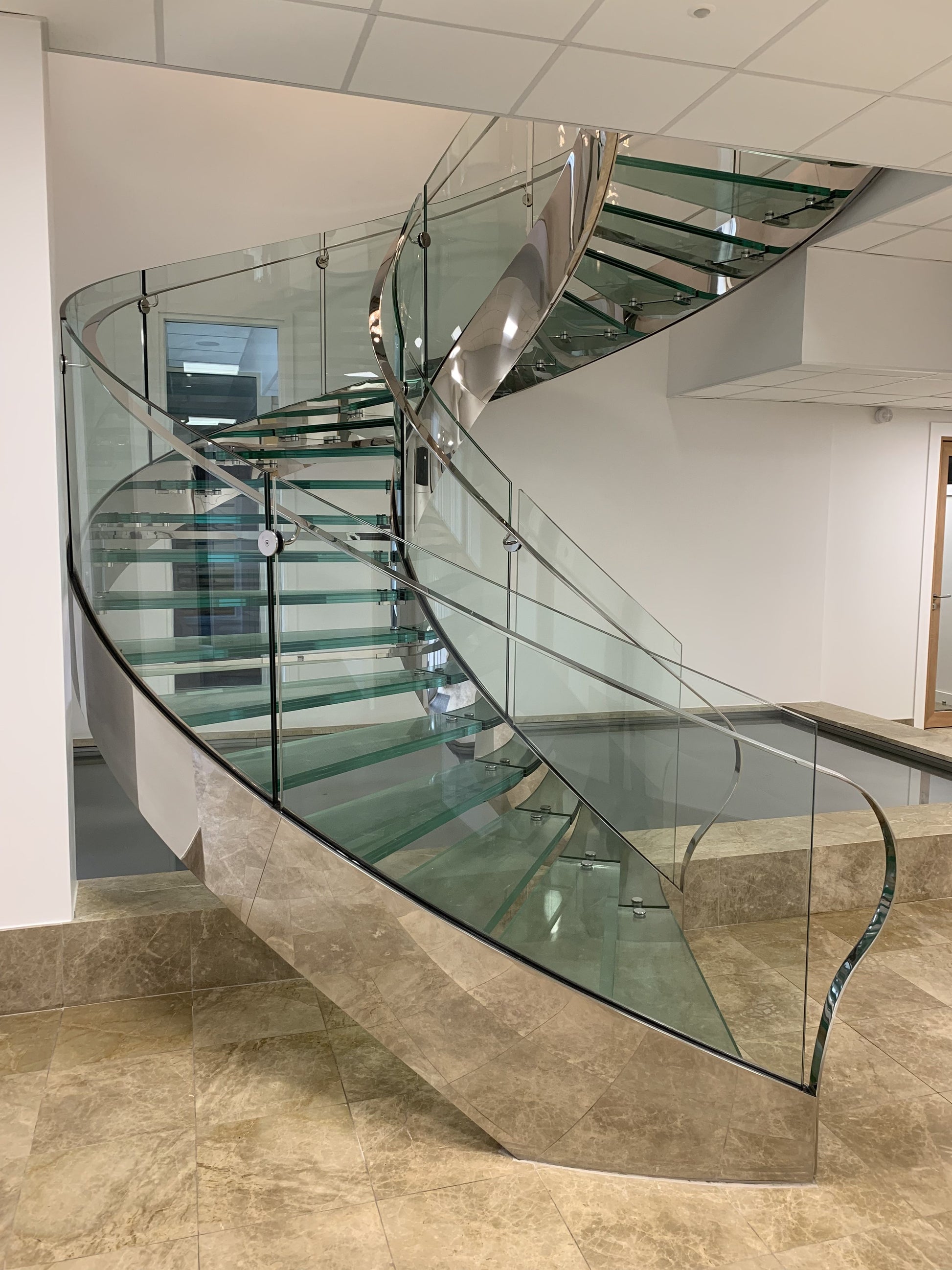 High- quality Curved Glass Staircase with Stainless Steel Accents