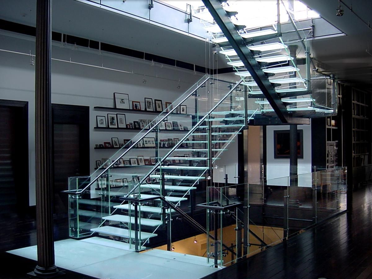Spacious glass straight staircase