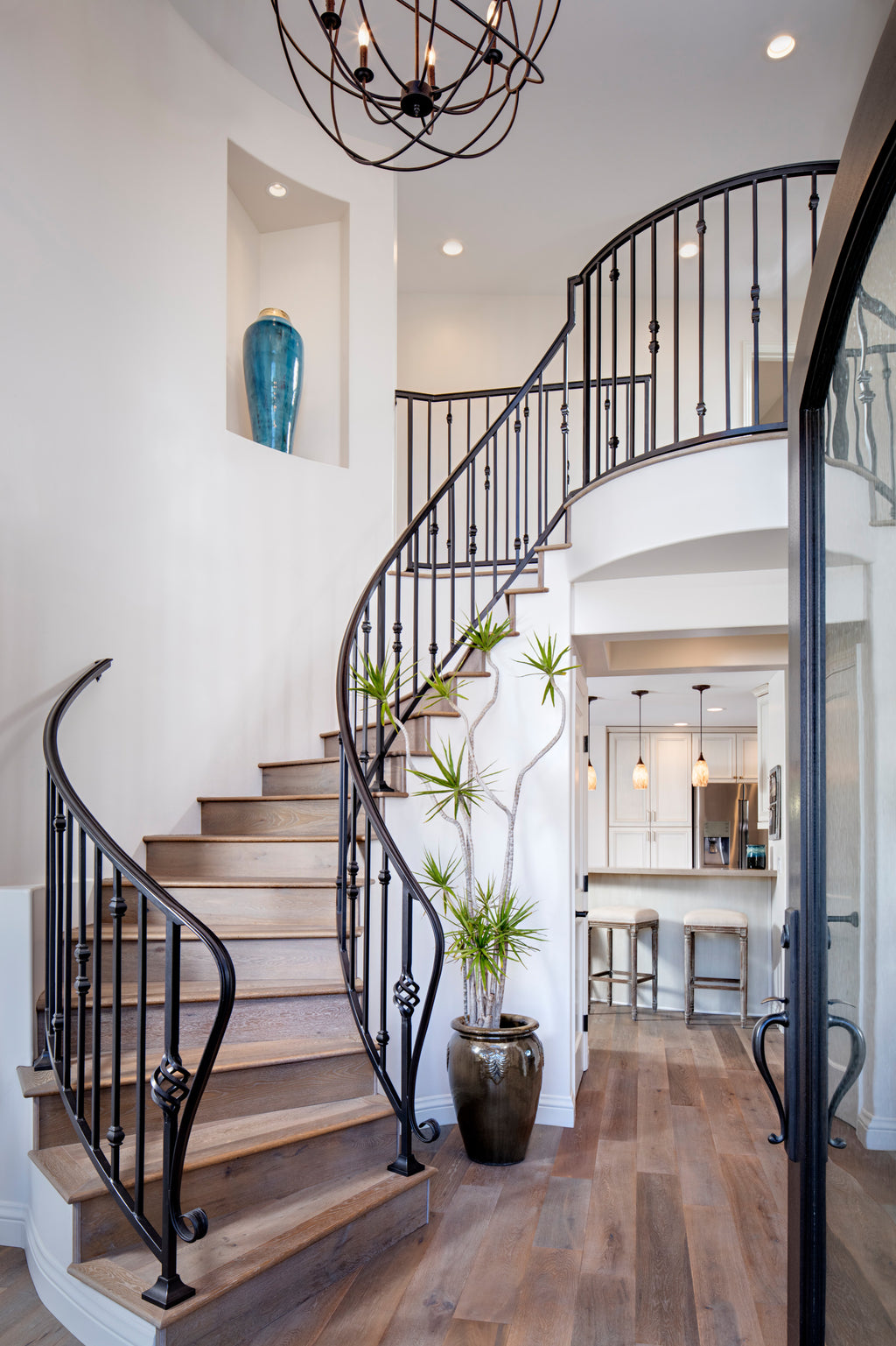 austaircase Villa Grand Foyer Curved Iron Stair Balustrade